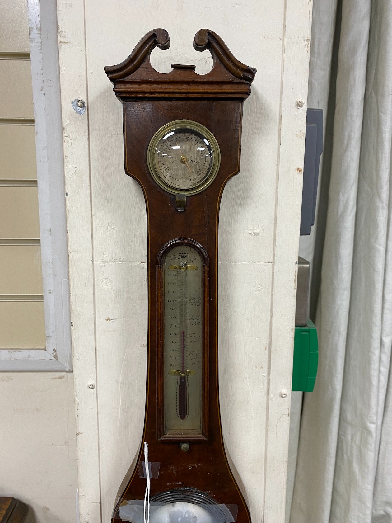 An early 19th century mahogany wheel barometer, height 98cm